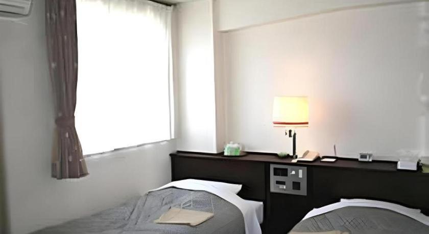 Hotel Town Honmachi Коті Екстер'єр фото